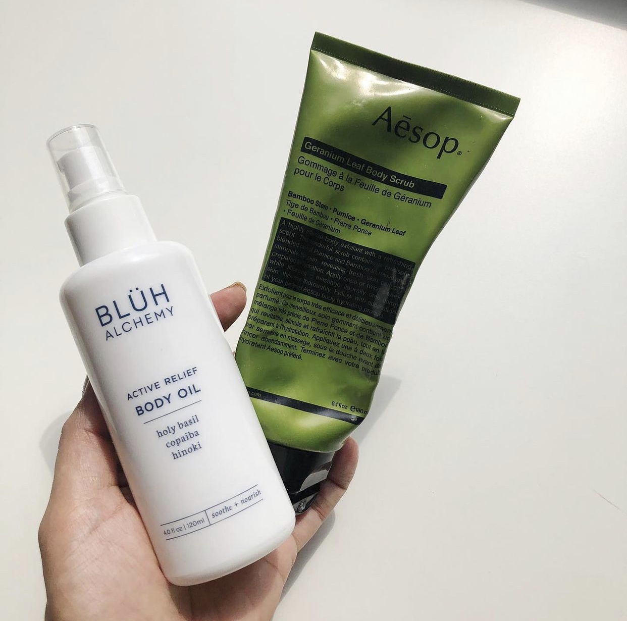 Product review: Bluh Alchemy’s Active Relief Body Oil and Aesop’s Geranium Leaf body scrub